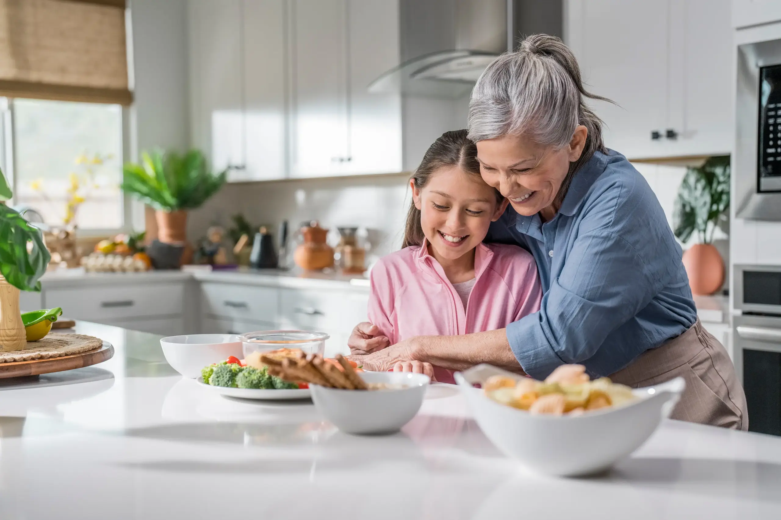 Beltone Main Banner - Beltone Serene grandma and child in kitchen