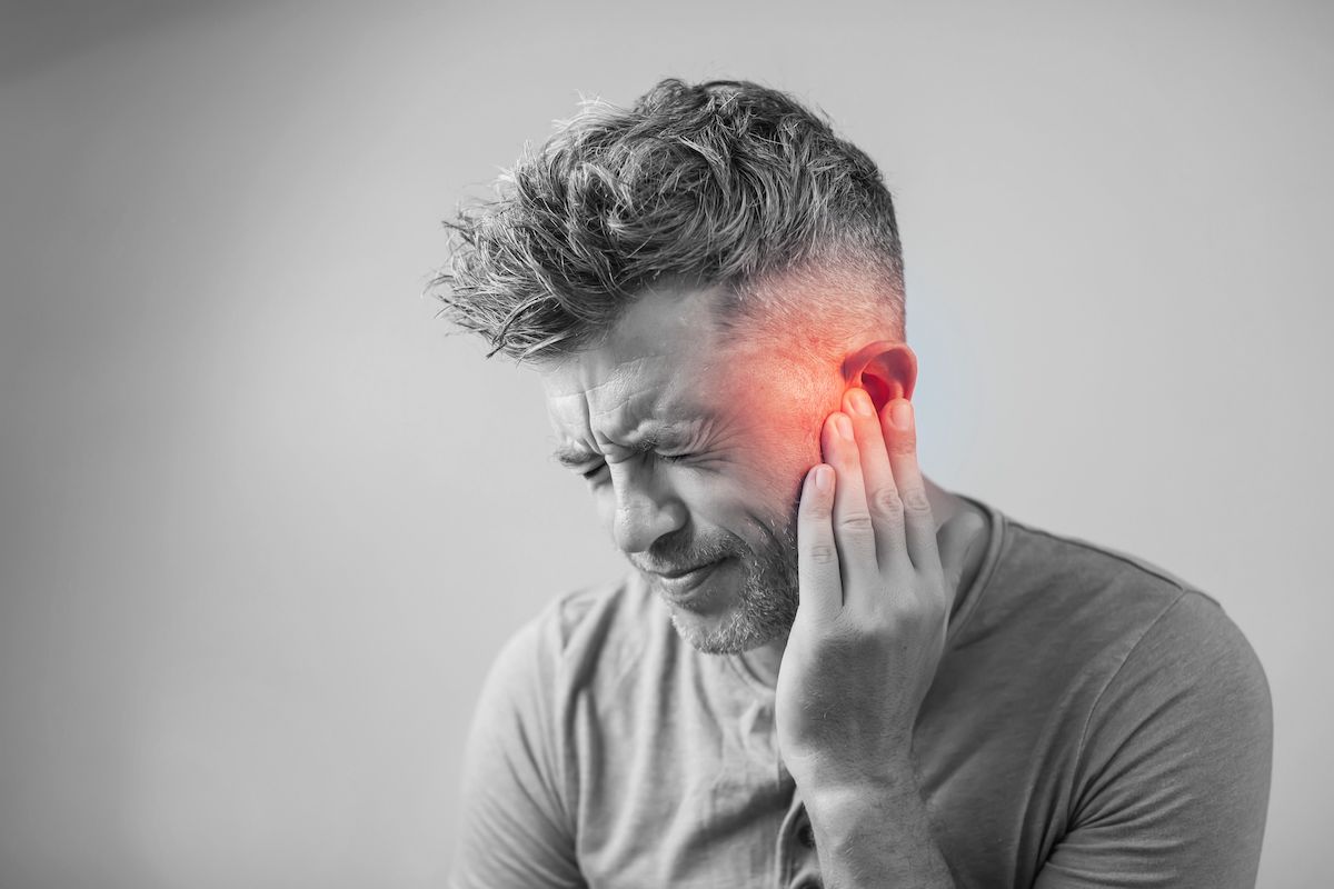 Image of person suffering from ear pain